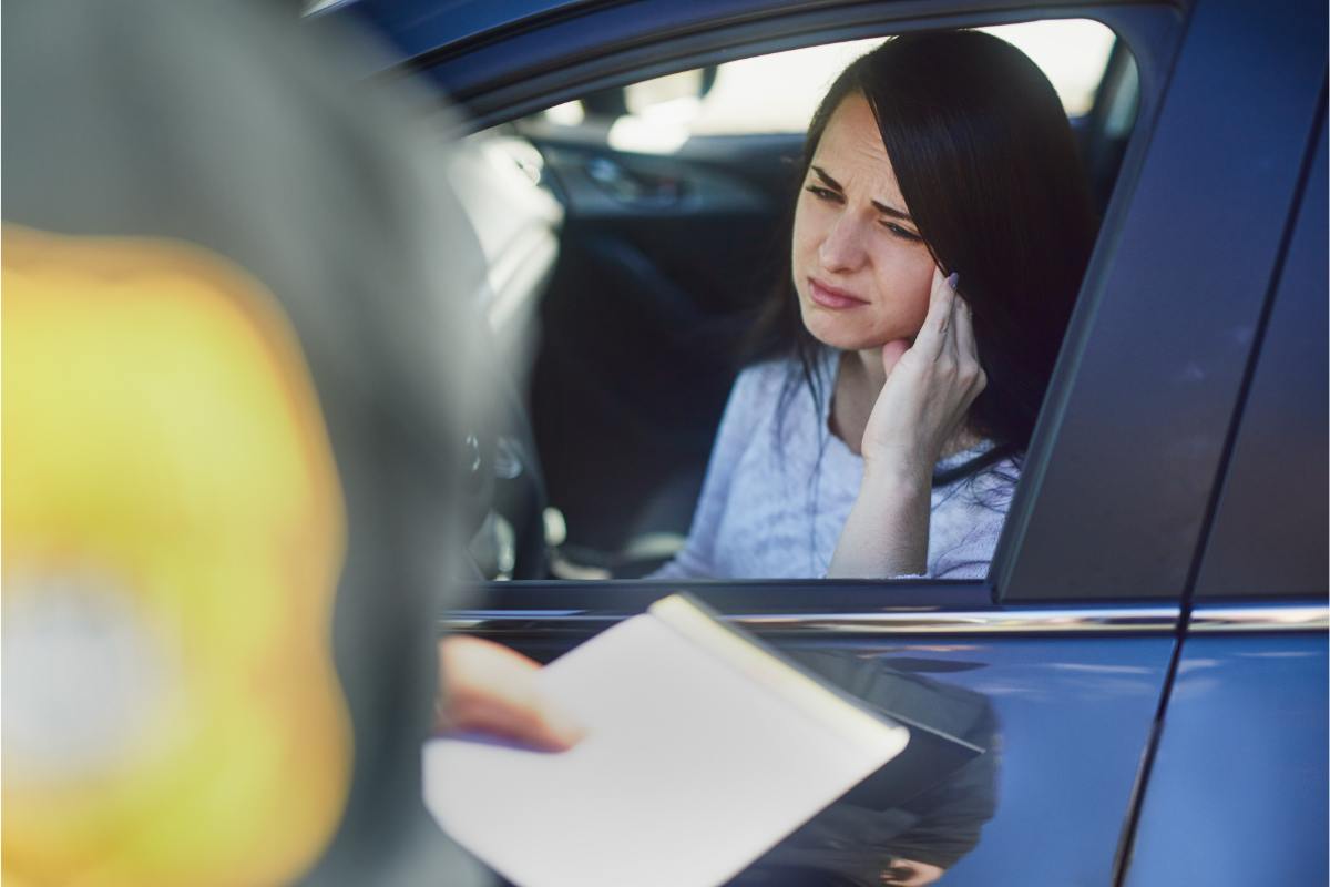 Donna auto multa